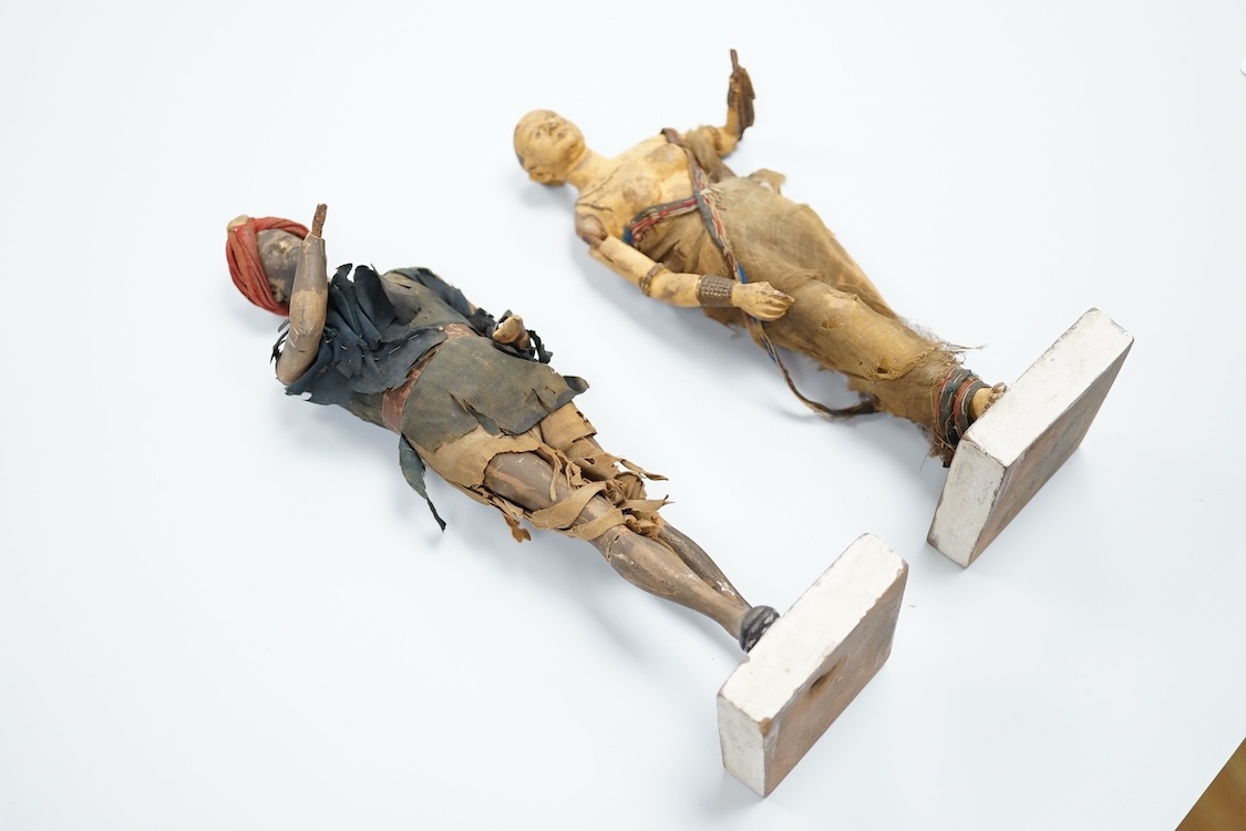 Two Indian clay figures, 26cm high